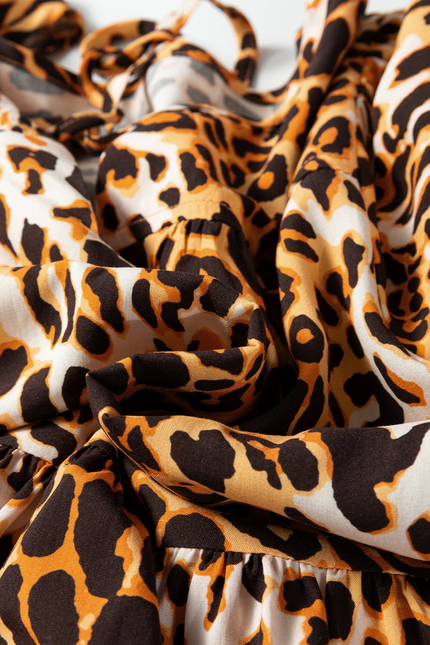 Leopard Print Short Puff Sleeve Slit Neck Babydoll Blouse